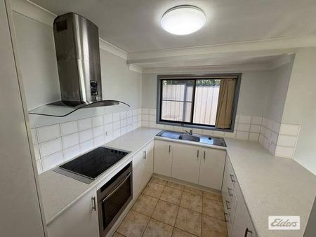 **Coming Soon - 2 Bedroom Brick Duplex** - Photo 2