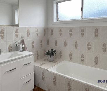 Two-Bedroom Duplex with Pool - Prime Location Near Orana Mall - Photo 2