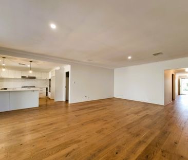 Spacious Family Living in a Prime Harrisdale Location - Photo 1