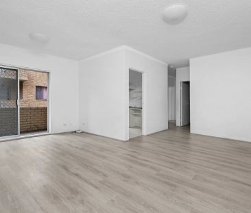 Well-Presented Two-Bedroom Apartment with Double Lock-Up Garage - Photo 1