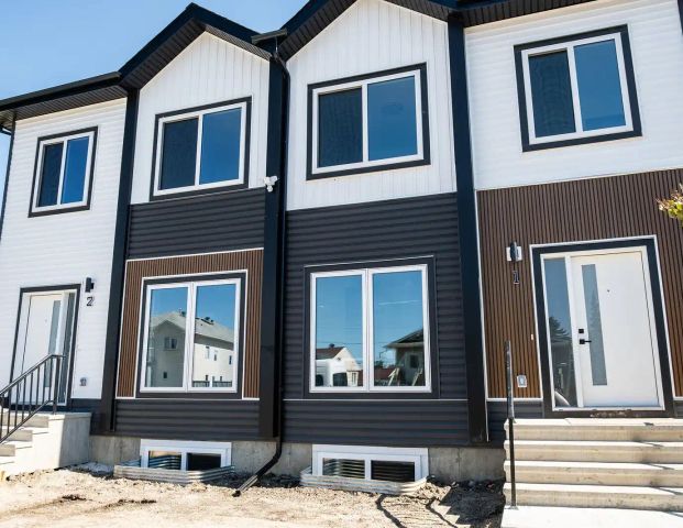 Brand New Modern 4-Bedroom Home + Finished Basement – Canora — 4 Bedrooms Fourplex - Photo 1