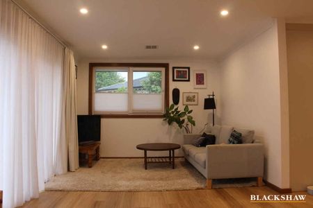 A Renovated 4-Bedroom Gem with Endless Potential - Photo 5