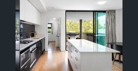 Modern Corner Apartment with Mountain Glimpses in Prime Location! - Photo 3