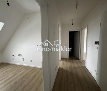 Erstbezug nach Sanierung: Helle Dachgeschosswohnung ca. 51 m² in Ho... - Foto 6