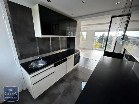 Appartement à louer 4 pièces 65.96m² - Photo 2