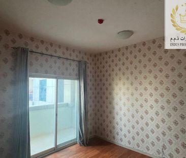 2 BR in Al Nuaimiya City Tower with Modern Amenities - Photo 1