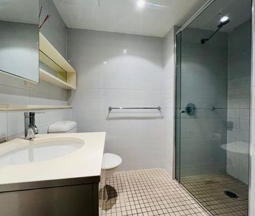 ONE BEDROOM WITH ENCLOSED BALCONY AND SECURED PARKING - Photo 5