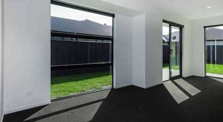 Modern 4-Bedroom Home Opposite Reserve in Lincoln - Photo 3