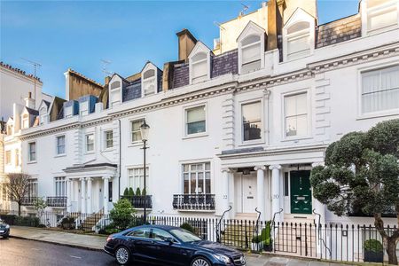 A glorious interior designed 5 bedroom house on a central and quiet Knightsbridge road. Spread over five floors and benefitting from an abundance of storage and two outdoor spaces. - Photo 5