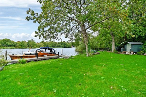 High-specification and recently completed home in a private gated development with wonderful landscaped gardens and river frontage. - Photo 1