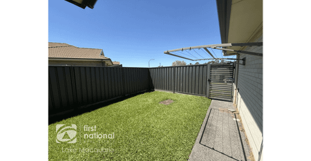 Modern 4-Bedroom Home with Multiple Living Areas - Photo 3