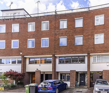 Arranged over five floors is this well-appointed mid-terrace townhouse, on this quiet road in Primrose Hill Village, opposite the park. - Photo 1