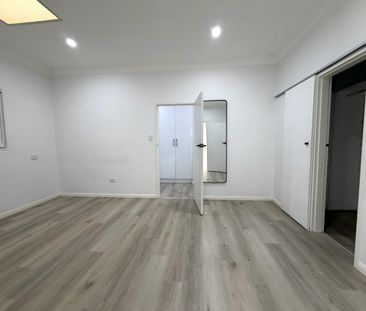 Stylish Fully Renovated Family Home with Rumpus Room! - Photo 5