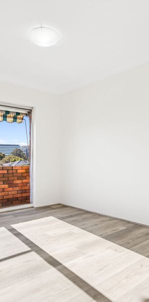 Sophisticated and Stylish Two Bedroom Apartment with Parking - Photo 1