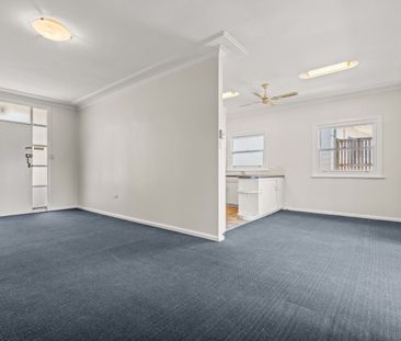 Charming Coastal Cottage with Space and Style - Photo 6