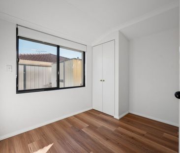 Spacious Family Living in a Convenient Queens Park Location - Photo 5