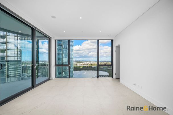 Near-New Luxury 2 Bedroom Apartment in the Heart of Rhodes Central - Photo 1