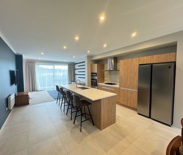 Modern, Light-Filled Family Home in Prime Long Bay Location - Photo 5