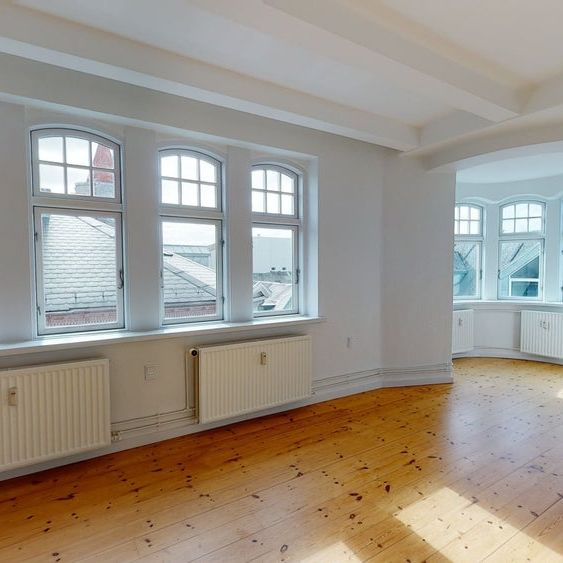 Centralt beliggende lejlighed med lys og livlig stemning - Photo 1