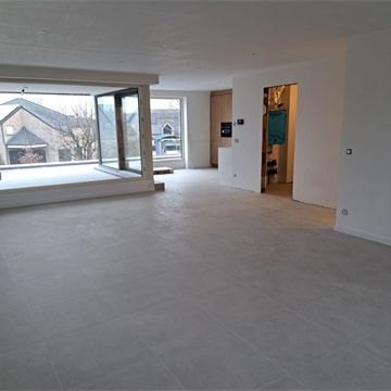 Een ruim en energiezuinig nieuwbouwappartement met terras op de eerste verdieping - Foto 1
