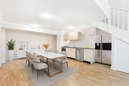 STUNNING LOFT STYLE SPLIT LEVEL ONE BEDROOM APARTMENT - Photo 2