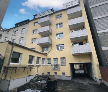 Gepflegte Drei-Zimmerwohnung mit modernem Duschbad und Balkon - Foto 1