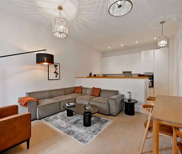 Welcome to this impeccably finished duplex apartment, where every d... - Photo 3