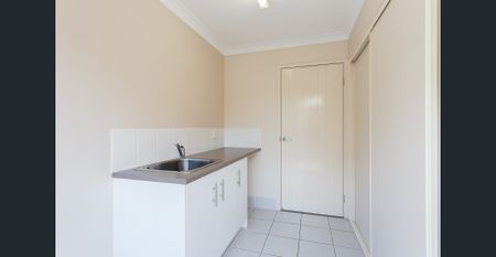 Expansive Family Home with Multiple Living Areas and Parkland Views - Photo 3