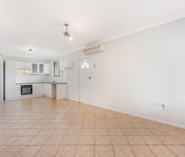 Tidy Flat with Water Included - Photo 1