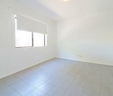 RENOVATED APARTMENT WITH STUDY/2ND BEDROOM - Photo 2