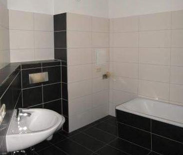 Wunderschöne und großzügige Familienwohnung mit hübschem Balkon! - Foto 1