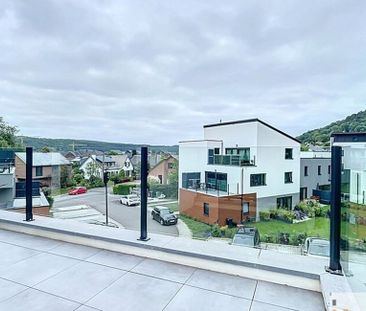 Appartement te huur in Andenne voor € 820 met 2 slaapkamers - Photo 2