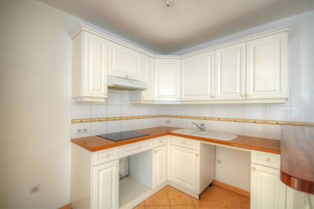 Location Appartement 3 pièces 67m² - Photo 3