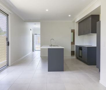 MODERN, STYLISH, AND READY TO ENJOY - WELCOME HOME TO 27 QUEST LANE! - Photo 2