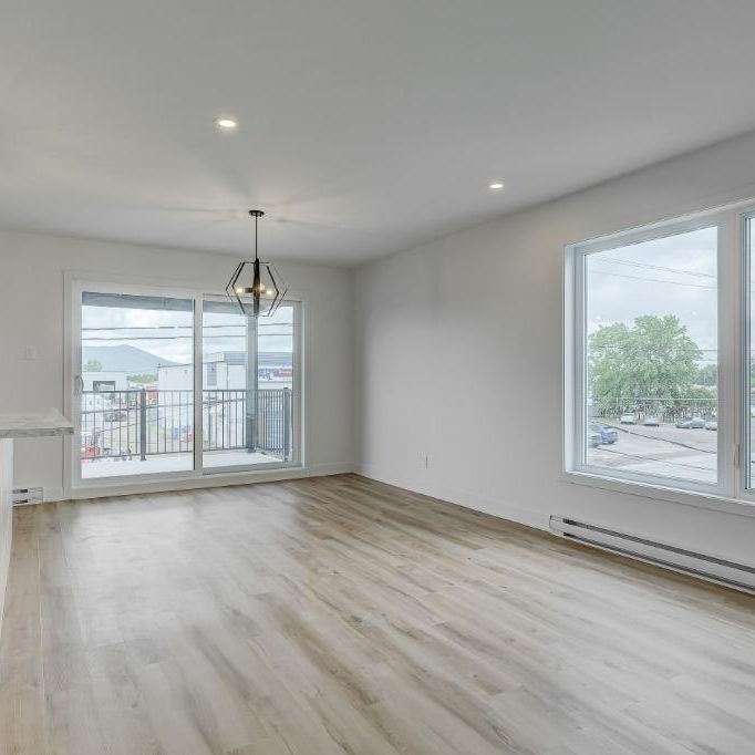 DERNIERE CHANCE VOICI NOTRE UNITÉ CONDO 5 1/2 AU 1ERE ÉTAGE AVEC 3 GRANDES CHAMBRES RIVE-SUD POUR LE 1ER JUILLET - Photo 1