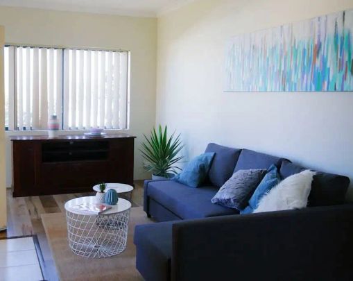 “Lovely Furnished Apartment!” - Photo 1