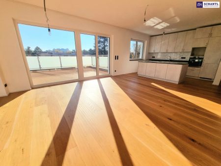 Lebensqualität pur im Dachgeschoss mit Terrasse und Garten! 4 Zimmer + Hochwertige Materialien + Viel Grün und Ruhe + Toller Blick! Ihr Rückzugsort mit WOW-Effekt! - Photo 2