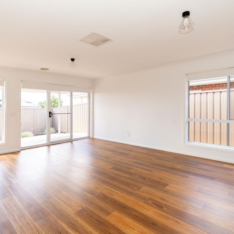 LOW MAINTENANCE LIVING IN A SOUGHT AFTER LOCATION - Photo 1