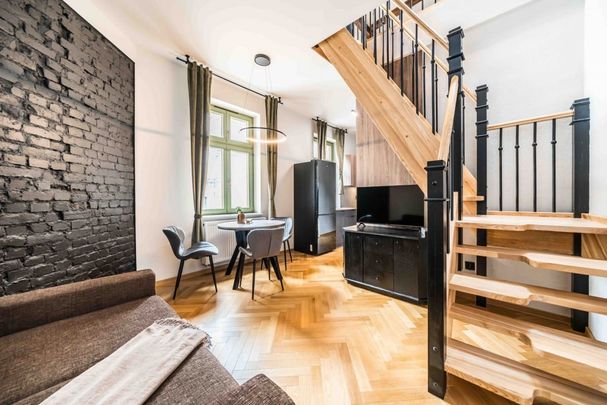 Dwupoziomowe loftowe mieszkanie kamienica Jeżyce 60 m² - Photo 1