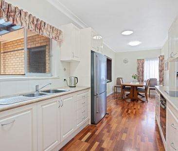 Cozy Family Home In A Convenient Location! - Photo 1