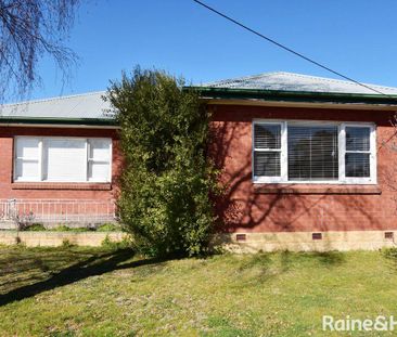 CENTRAL LOCATED UPDATED BRICK HOME - Photo 3