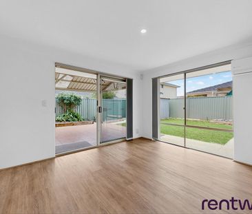 Charming 3-Bedroom Duplex in Prime Location - Photo 1