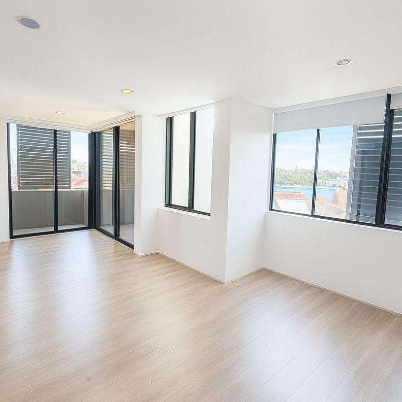 Spacious Four-Bedroom Home with Split-Level Design in a Peaceful Harbourside Setting - Photo 1