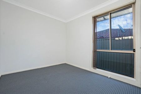 “Three Bedroom Family Home” - Photo 2