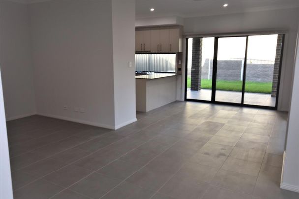 MODERN FOUR BEDROOM HOME IN LEAFY GOLDEN GROVE - Photo 1