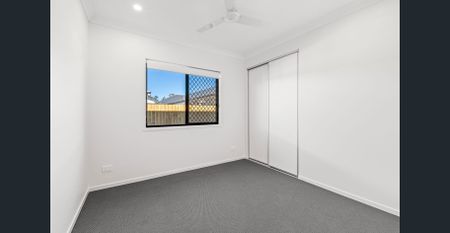 BRAND NEW SPACIOUS AND MODERN 4 BEDROOM HOME AVAILABLE NOW! - Photo 3