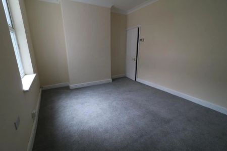 Spacious four bedroom end of terrace home with accommodation arranged over three storeys features include; double glazing and courtyard to rear. VIDEO TOUR COMING SOON!!!!! - Photo 5