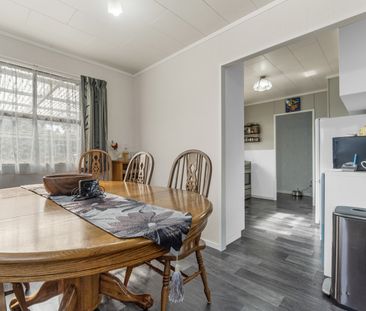 This spacious 4-bedroom, 2-bathroom home is located in the heart of... - Photo 6