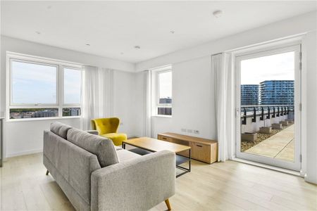 A large three bedroom penthouse apartment finished to a high specification and located within Wallbrook Gardens, benefitting from exceptional on-site amenities, communal gardens and only a 6-minute walk to Canning Town Station. - Photo 2