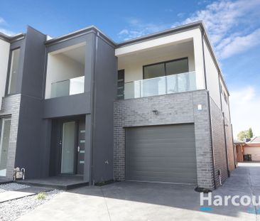 Modern 3-Bedroom Home with Natural Light and Balcony - Photo 2